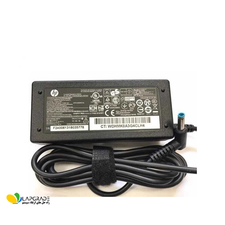 برچسب مشخصات فنی شارژر لپ تاپ اچ پی مدل ADP-65SB-BB شامل ولتاژ 19.5 ولت، جریان 3.33 آمپر، توان 65 وات و لوگوی HP